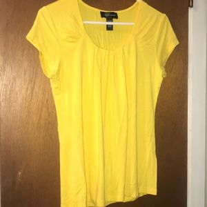 Yellow tee with simple detail